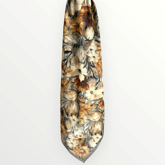 Floral patterned tie on a white background